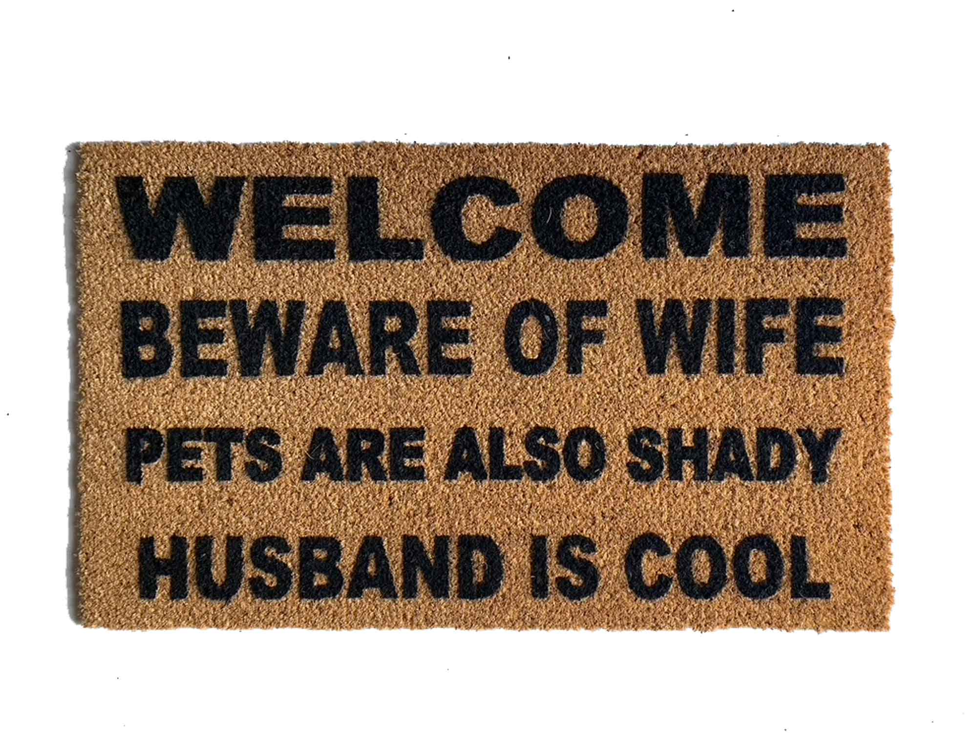 https://www.damngooddoormats.com/sites/damngooddoormats.indiemade.com/files/beware-of-wife-kids-pets-also-shady-husband-is-cool-funny-rude-mothers-day-gift-outdoor-coir-damn-good-doormat.jpg