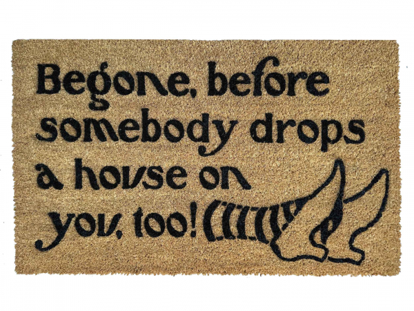 Begone, before somebody drops a house on you, too! Wizard Oz mat ruby slippers