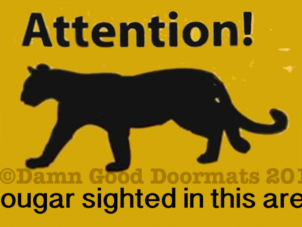 Attention! Cougar sighted in the area. funny doormat