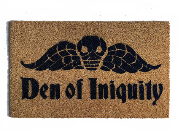 natural coir doormat with gothic skull with wings reading "den of iniquity"