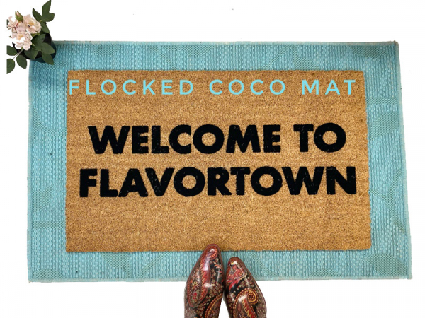 Guy Fieri quote "Welcome to Flavortown" on a natural coir doormat