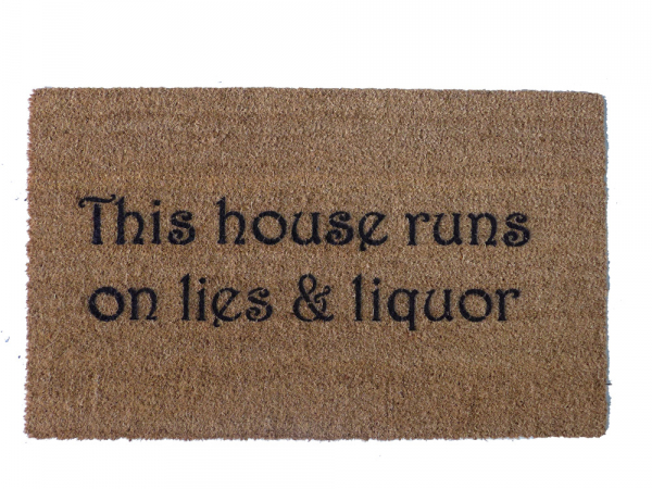This house runs on lies & liquor™ doormat