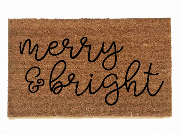 outdoor coir doormat reading "merry and bright"