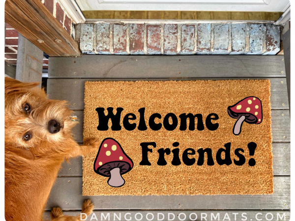coir outdoor doormat with psychedelic mushrooms and words welcome friends on it
