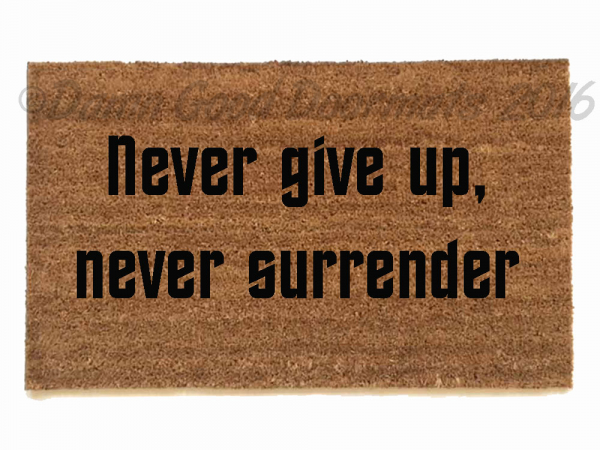 Never give up, never surrender. Galaxy Quest welcome doormat-novelty geek stuff