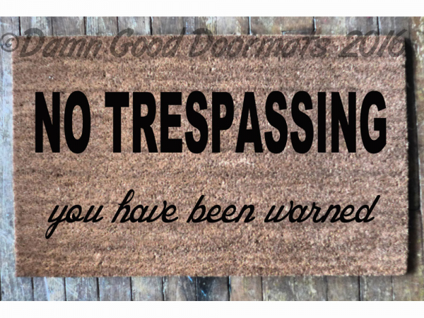 NO TRESPASSING, you have been warned doormat