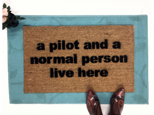 a PILOT and a normal person live here, funny aviator doormat