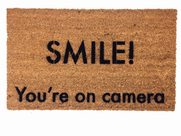 smile! You're on camera, funny security sign doormat