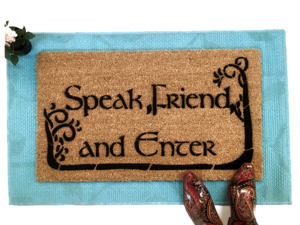 picture of an outdoor coir doormat reading Speak, Friend, and Enter