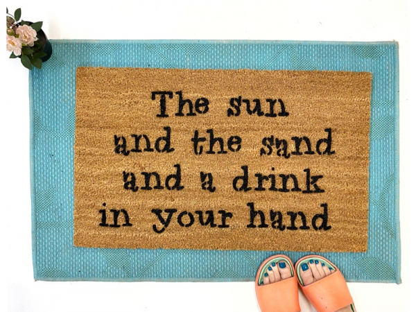 Sun sand drink in hand funny beach house doormat