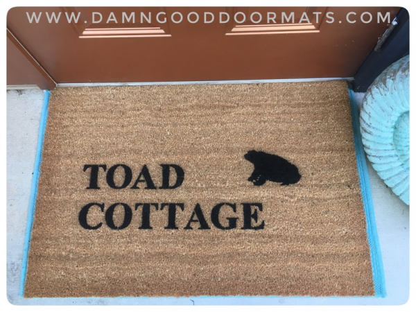 picture of coir outdoor doormat reading toad cottage with a silhouette of a toad