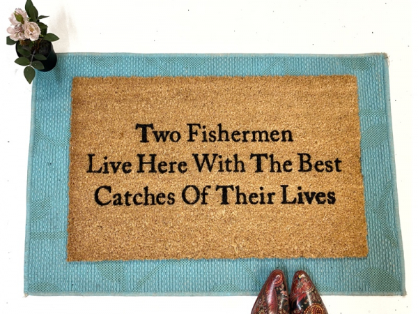 Two Fishermen live here with the best catches of their lives. funny coir doormat