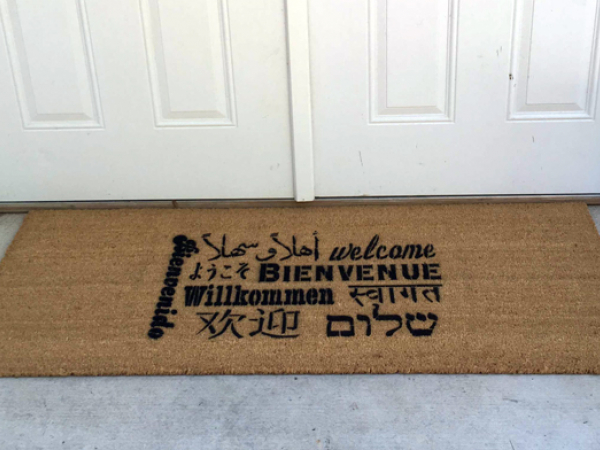 Welcome in all languages doormat in French, Spanish, Hebrew, Arabic, Italian,