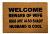 outdoor coir doormat reading welcome beware of wife, kids also shady, husband co
