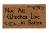 picture of a coir outdoor doormat reading "not all witches live in salem"