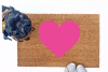 cute pink heart Valentine's Day doormat shown with a little black pug
