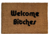 outdoor coir doormat with text "welcome bitches" on it