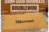 double wide doormat coir doormat reading "Valkommen!!" swedish for welcome