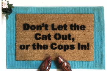 dont let the cats out or the cops in funny doormat