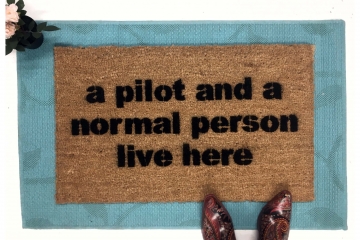 a PILOT and a normal person live here, funny aviator doormat