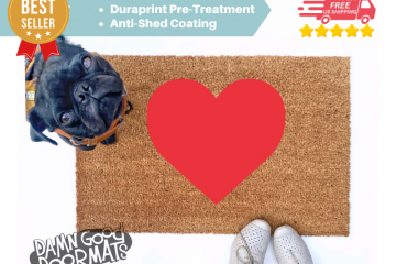 cute red heart Valentine's Day doormat shown with a little black pug
