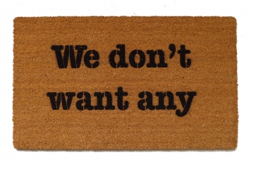 We don't want any. rude funny novelty doormat