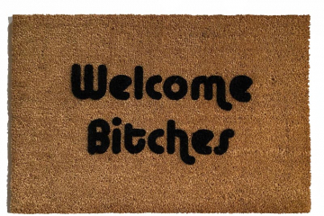 outdoor coir doormat with text "welcome bitches" on it