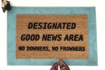 Designated Good News Area- no downers, no frowners Funny doormat