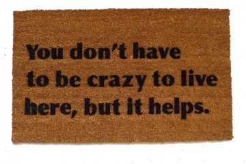 You don't have to be crazy to live here, but it helps. funny doormat