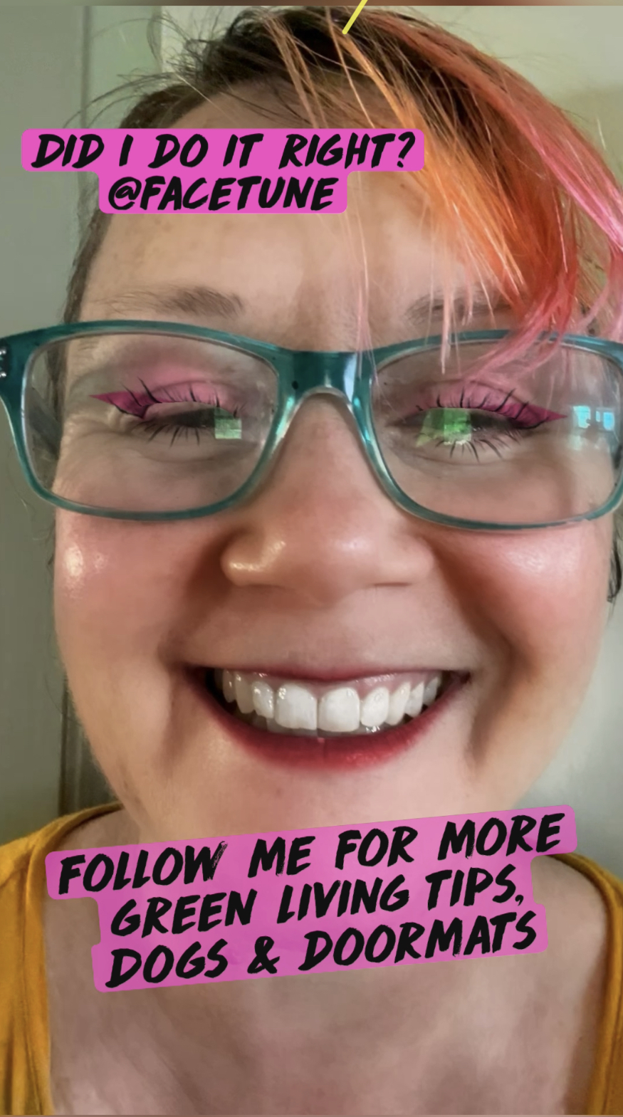 pink haired woman using fresh pineapple as a facial enzyme scrub making a. happy face 