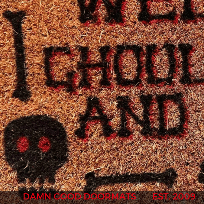 Close-up of a durable coir Halloween doormat built to survive October weather.