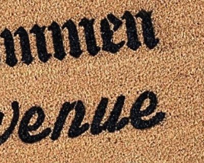 Close-up of a durable coir welcome mat, the one thing renters can change without losing a deposit.