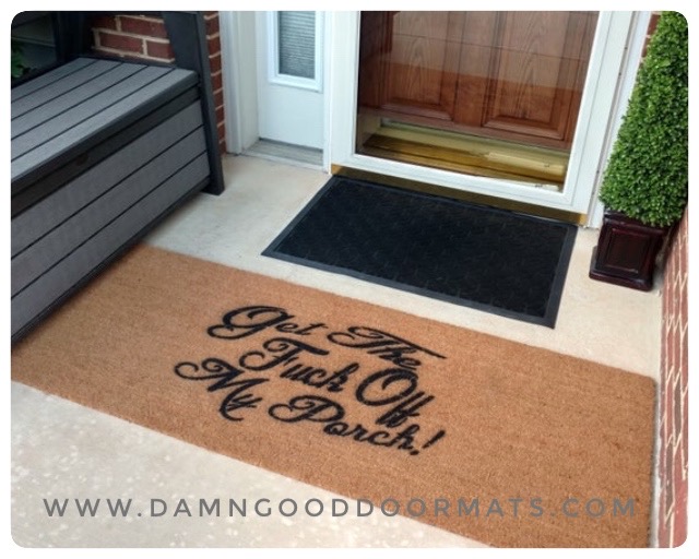 A rude custom doormat on a real front porch, the gift that gets used every day.