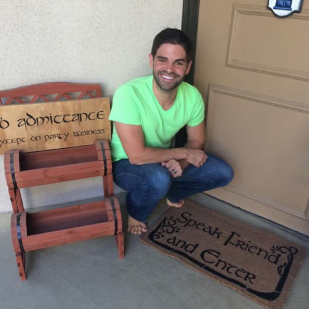 happy customer with their speak friend and enter tolkien doormat at their entryway