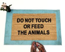 Do not touch or feed the animals funny family doormat
