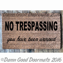 NO TRESPASSING, you have been warned doormat