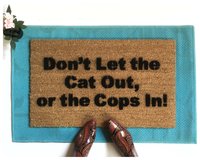 dont let the cats out or the cops in funny doormat
