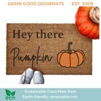lifestyle photo Hey there Pumpkin coir outdoor Doormat with cute white shoes