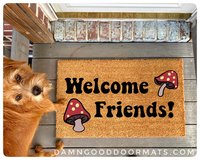 coir outdoor doormat with psychedelic mushrooms and words welcome friends on it