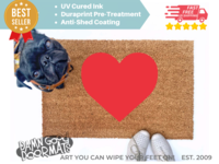 cute red heart Valentine's Day doormat shown with a little black pug