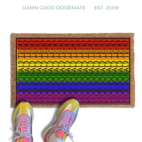 subtle fuck donald trump doormat in abstract contemporary design on a gay pride rainbow flag. 