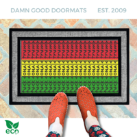 subtle fuck donald trump doormat in abstract contemporary design over the pan african flag. 
