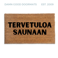 Natural coir doormat with black lettering reading tervetuloa saunaan, a Finnish sauna welcome mat