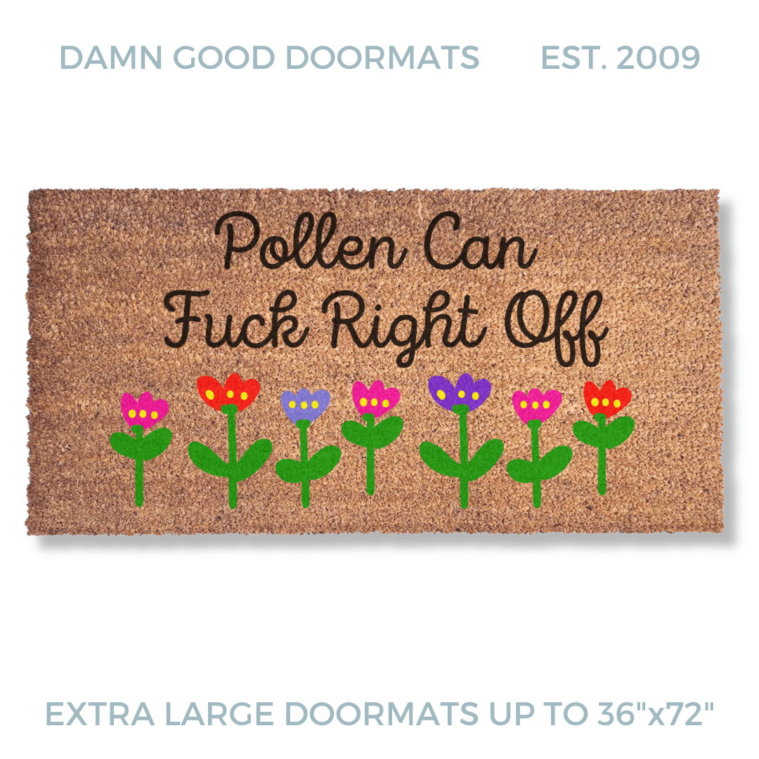 promotional image of a coir doormat reading "pollen can fuck right off" in cursive with red and purple tulips across the bottom