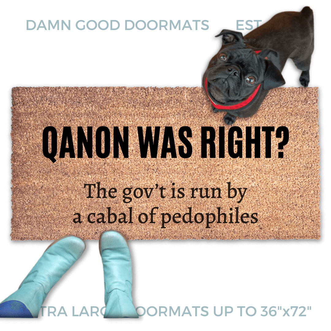 Qanon coir doormat saying "Qanon was right? The government is run by a cabal of pedophiles" . A pair of feet wearing baby blue boots stands with a black pug dog sitting on the floor next to them. 