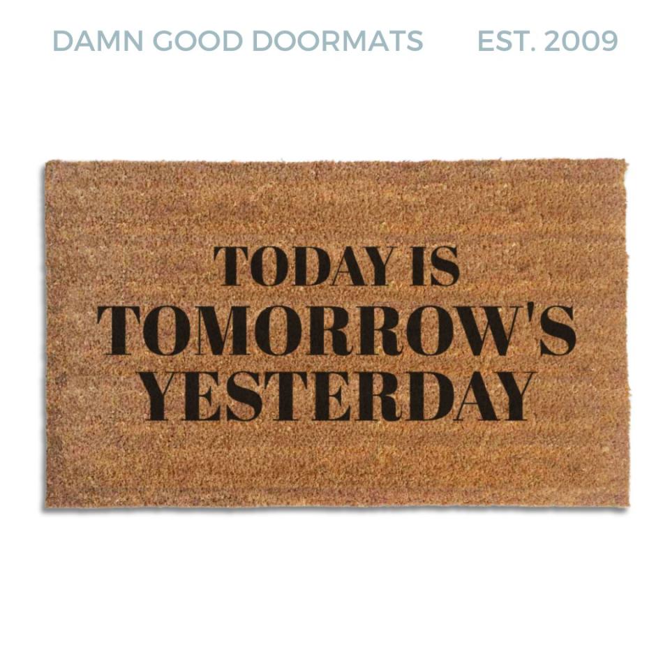 Coir doormat printed with Today Is Tomorrow's Yesterday in black serif capitals