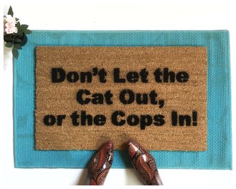 dont let the cats out or the cops in funny doormat