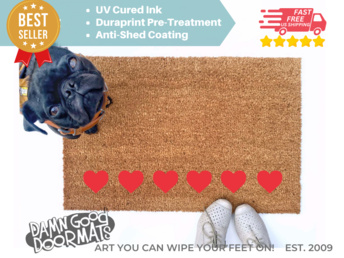 cute row of red hearts Valentine's Day doormat shown with a little black pug