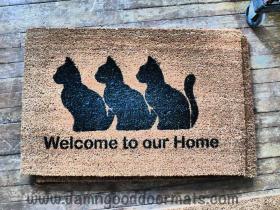 Sustainable coir doormat reading 'Welcome To Our Home' cat-themed welcome mat for front door