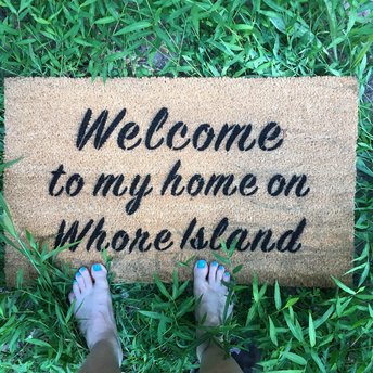 Welcome home on whore island, anchorman, funny doormat, rude doormat, lady boss,